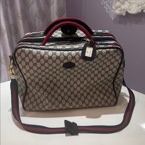 Gucci Men's Black and Cream Patterned Duffel Bag
